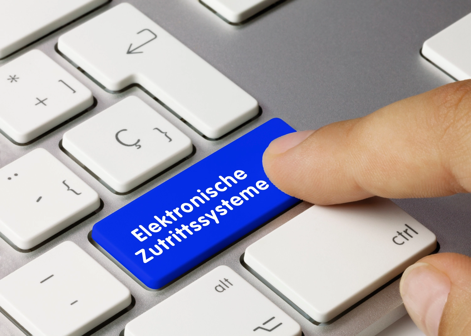 NEXLINK GmbH - Bauconsulting I Projektmanagement - Elektronische Zutrittssysteme - Wort auf blauen taste. 